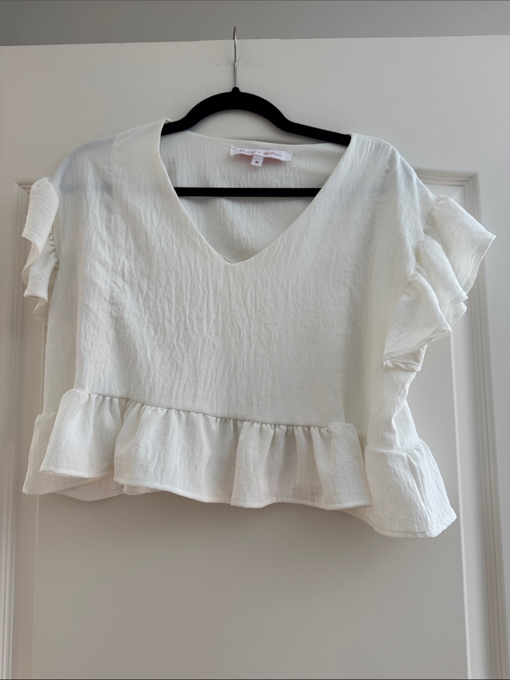 V-Neck White Ruffle Peplum Blouse